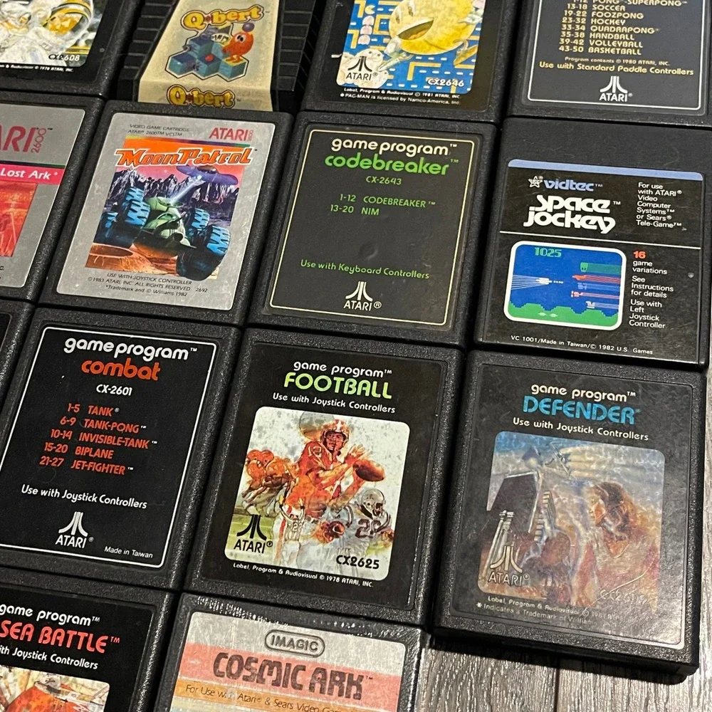Atari 2600 Vintage Game Lot 18 Cartridges PacMan Space Invaders Spider-Man Qbert